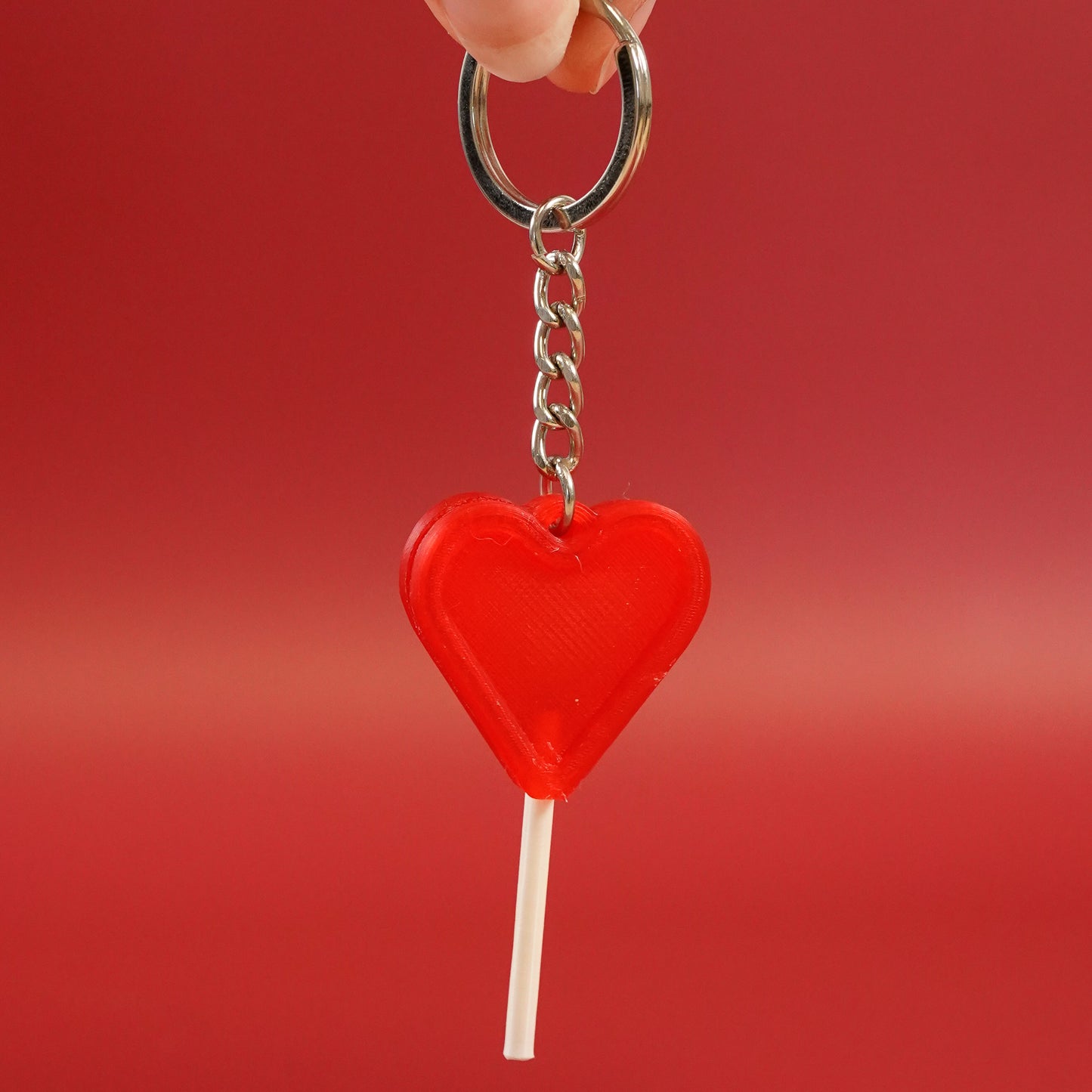 Porte-clé Sucette coeur rouge translucide