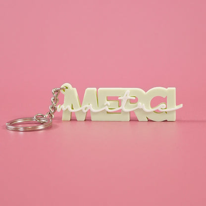 Porte-clé Merci maître vert pastel