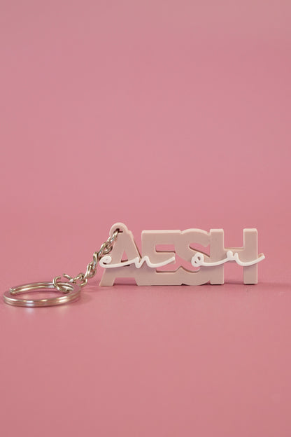 Porte-clé AESH en or