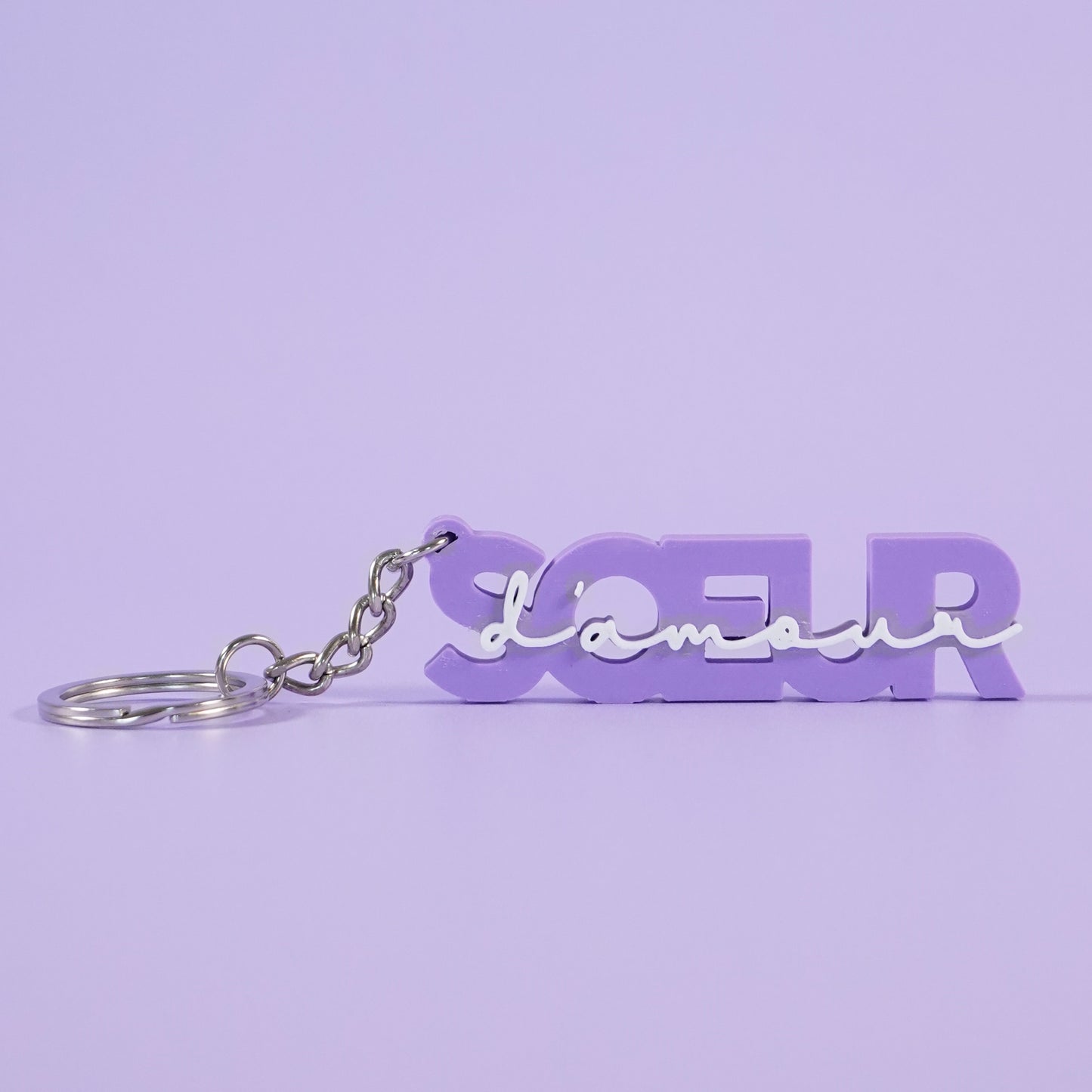 Porte-clé soeur d'amour ultra violet