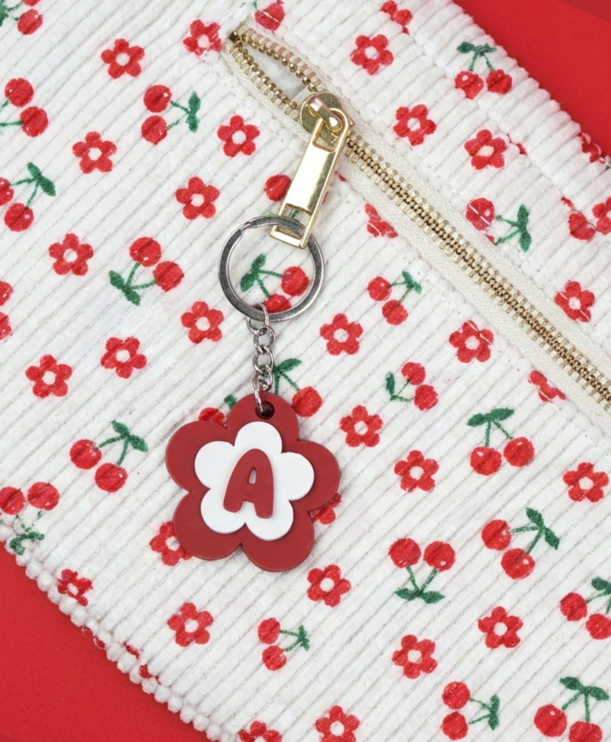 Porte-clé lettre fleur